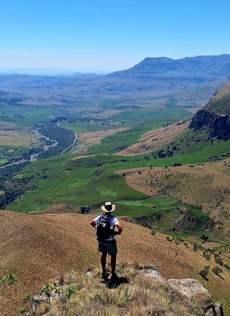 Man looking at mountains