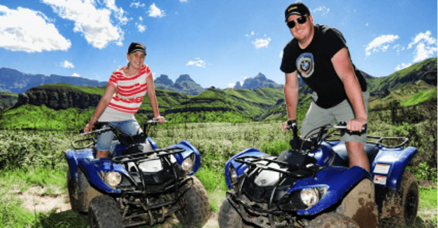 Couple on quad bikes